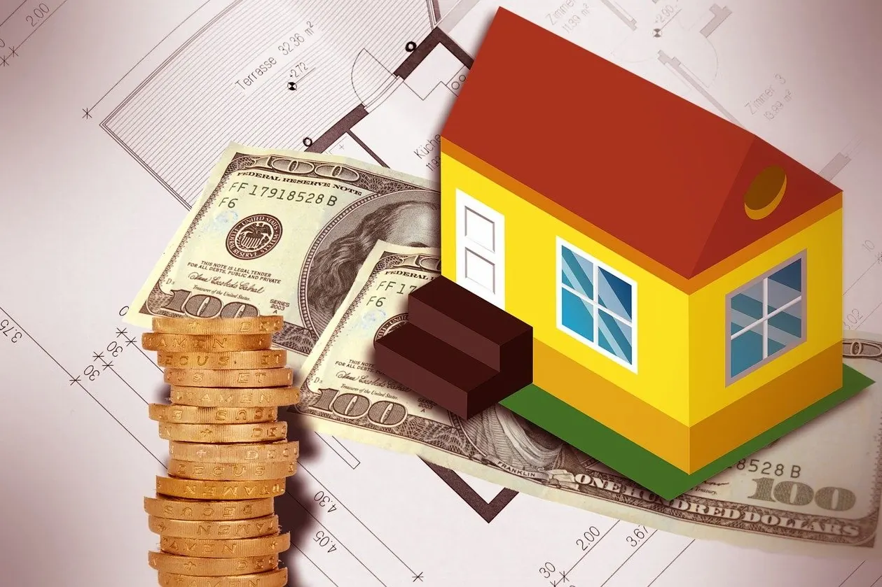 House model with cash representing procurement budgeting