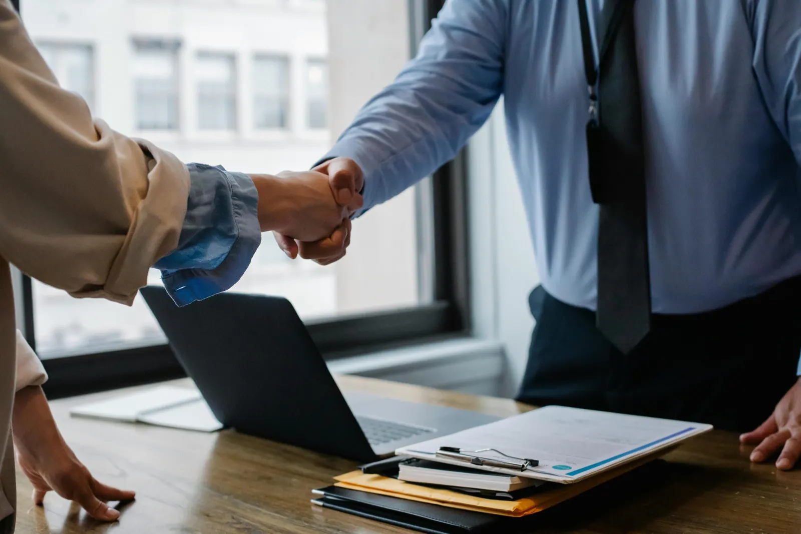 Business handshake sealing a supplier contract in China