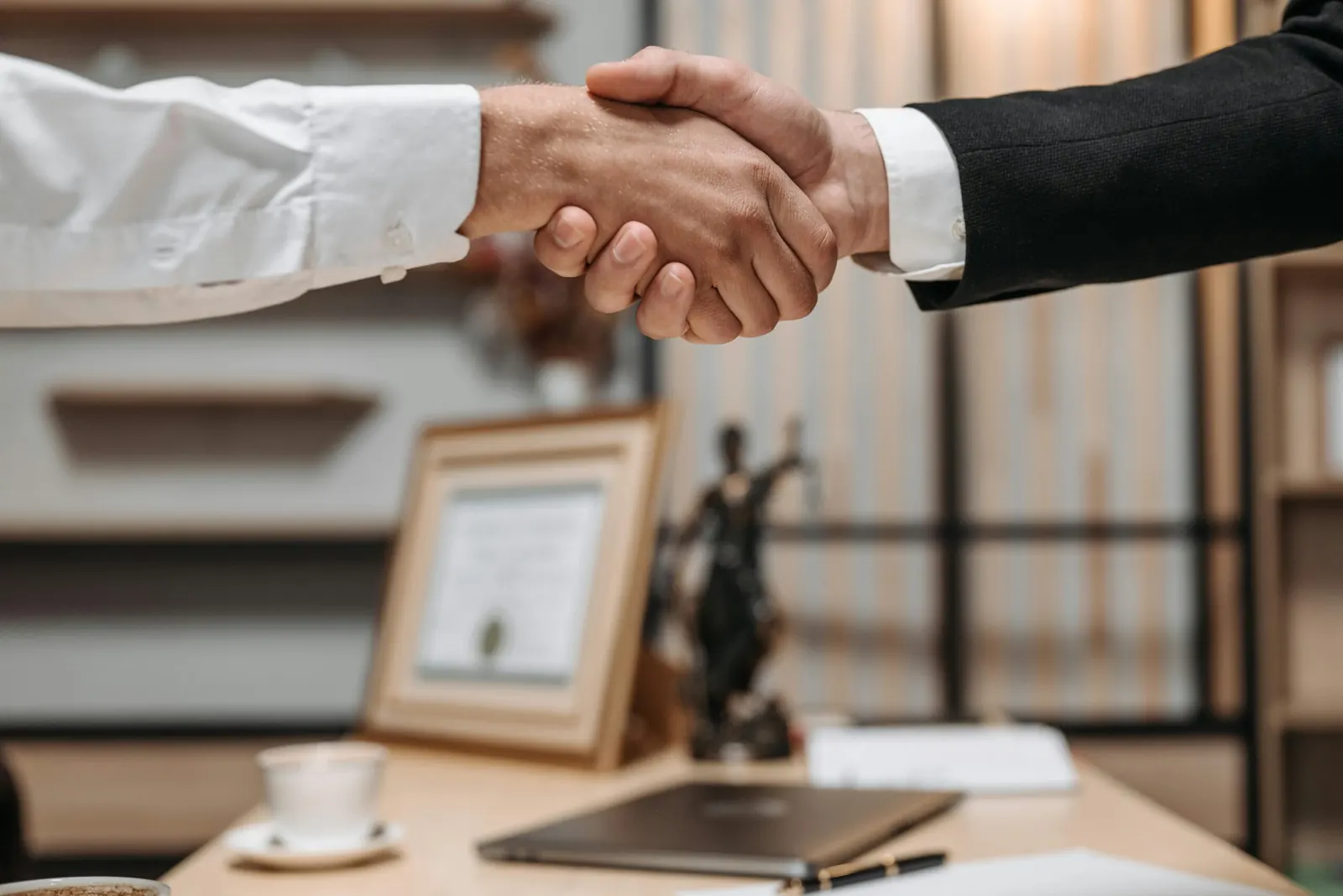 Handshake confirming a long-term supplier partnership